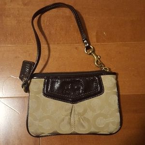 Coach zippered wristlet brown